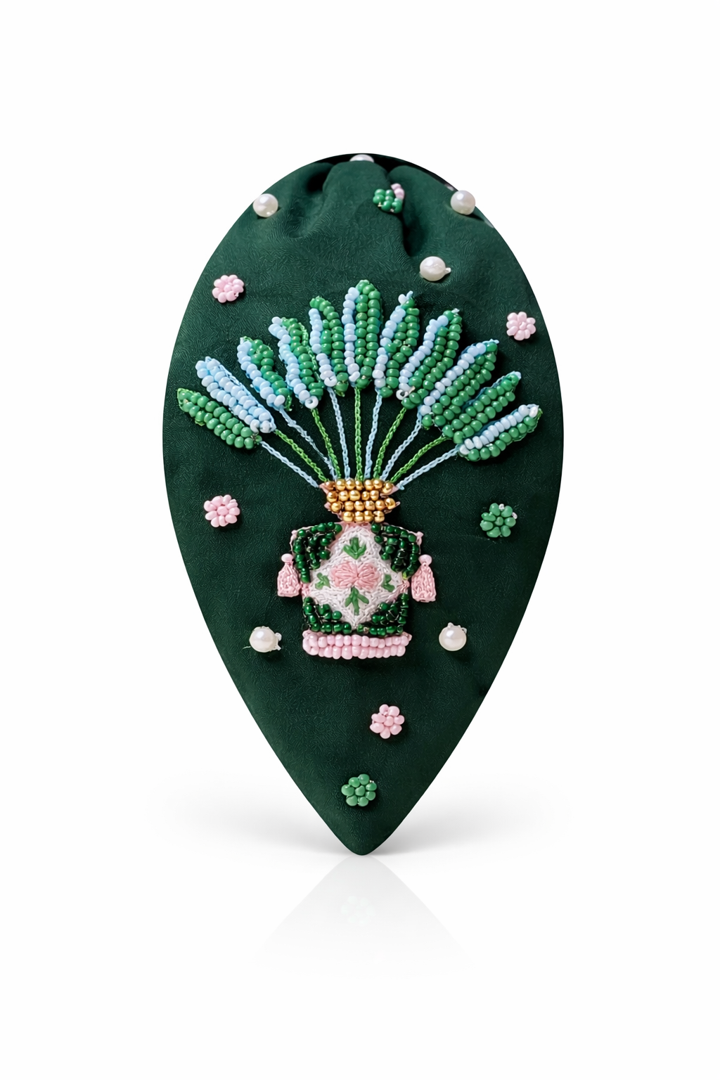 Emerald green padded headband with hand-embroidered traveller palm and Peranakan-inspired motif beadwork