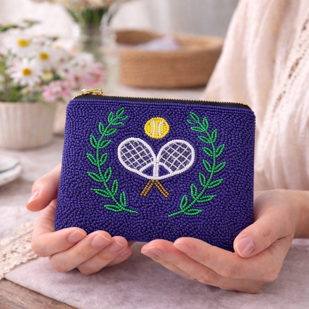 Lady-holding-beaded-coin-pouch-with-tennis-design