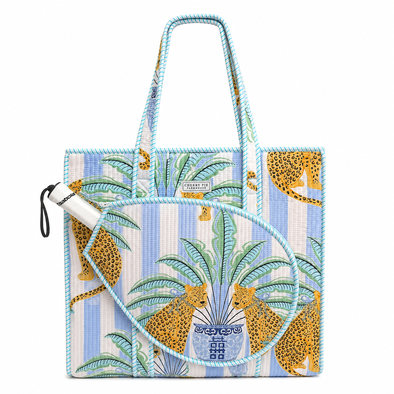 Blue striped quilted racquet tote bag with palm and leopard print and front tennis and padel racquet compartment by Cherry Pie Farmhouse, with padel racket