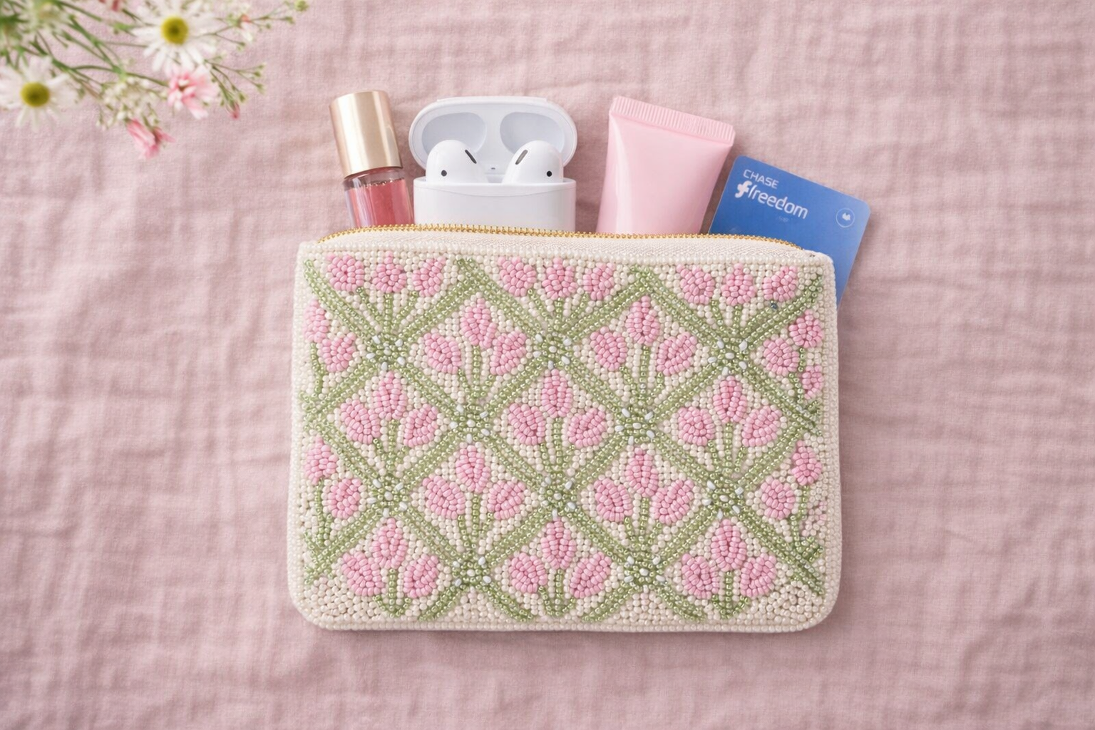 Small embroidered coin pouch with coins cards AirPods and lipstick