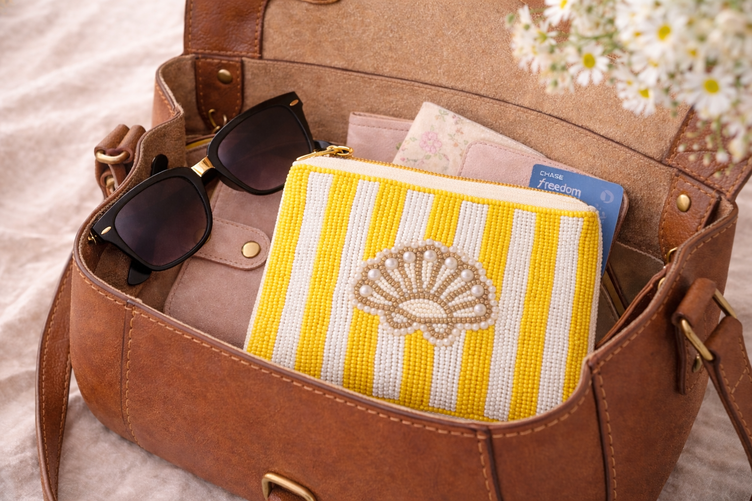 Hand embroidered coin pouch inside handbag