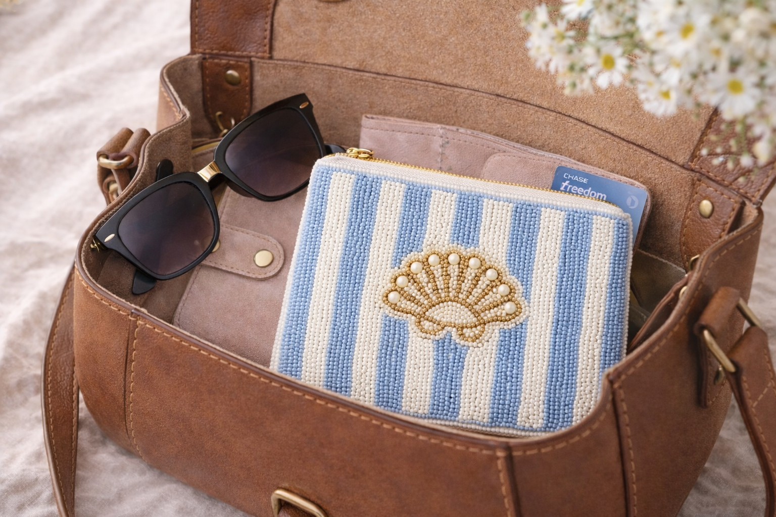 Hand embroidered coin pouch inside handbag