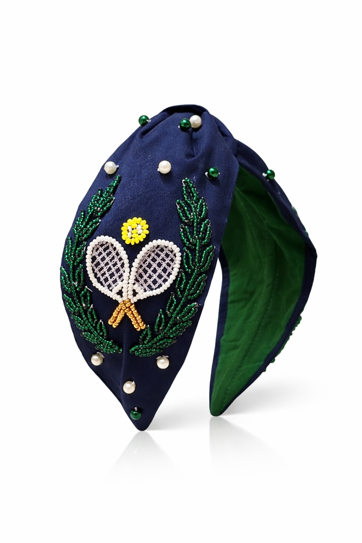 Side angle of Tennis club hand-embroidered headband with gift pouch