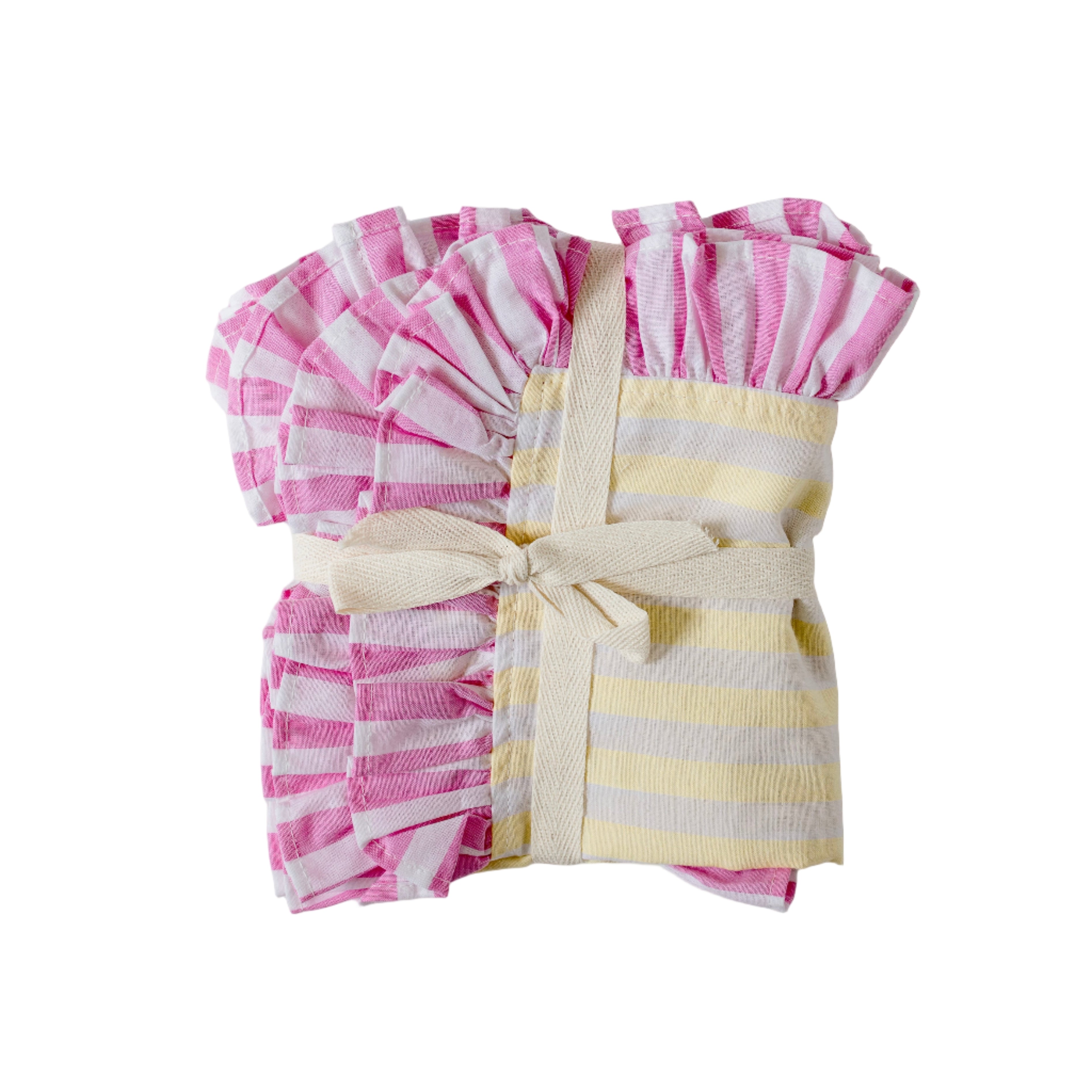 Soft pastel striped cotton placemats in yellow and pink with delicate frilled edges styled for a cottagecore garden brunch