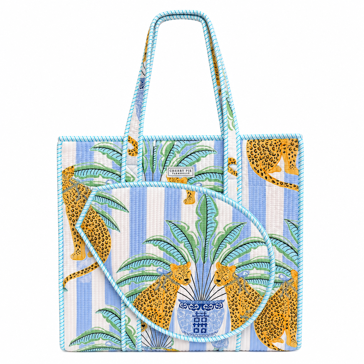 Blue striped quilted racquet tote bag with palm and leopard print and front tennis and padel racquet compartment by Cherry Pie Farmhouse