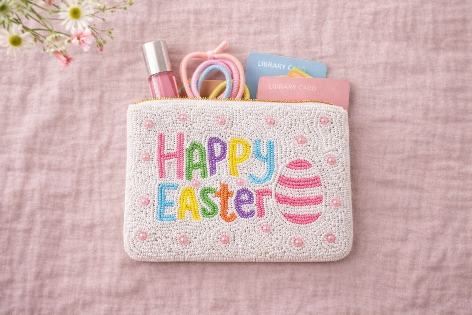 Small embroidered coin pouch with coins cards AirPods and lipstick