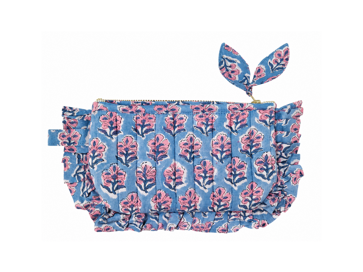 Dusty blue quilted cotton frill pouch with pink floral block print and gold zipper on a white background