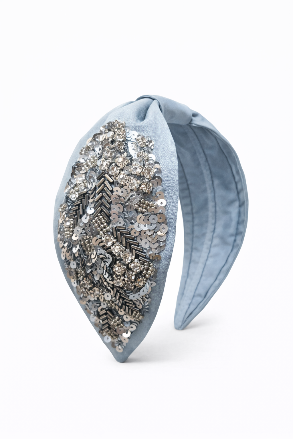 side angle of silver bejewelled hand-embroidered headband with gift pouch