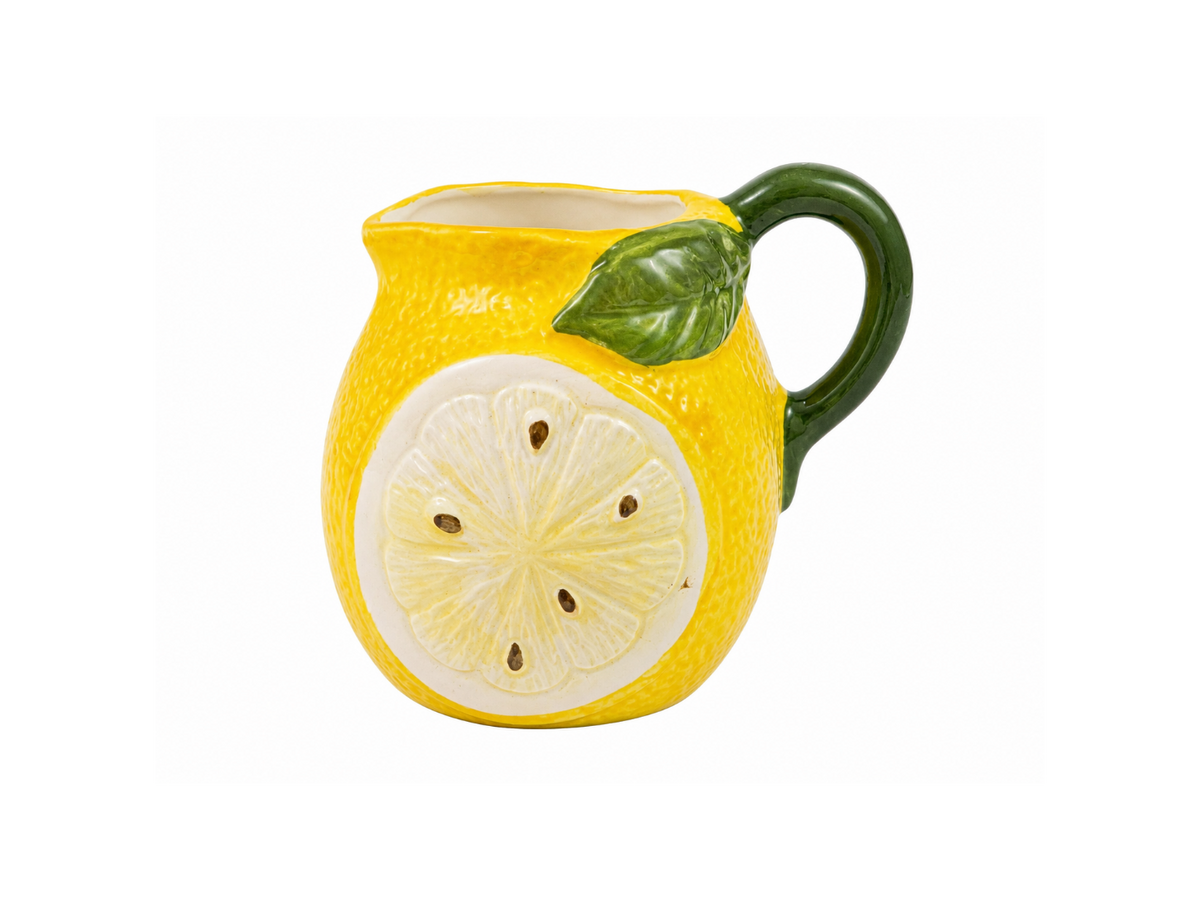 Yellow lemon-shaped hand-painted Italian ceramic milk jug with green handle and leaf detail