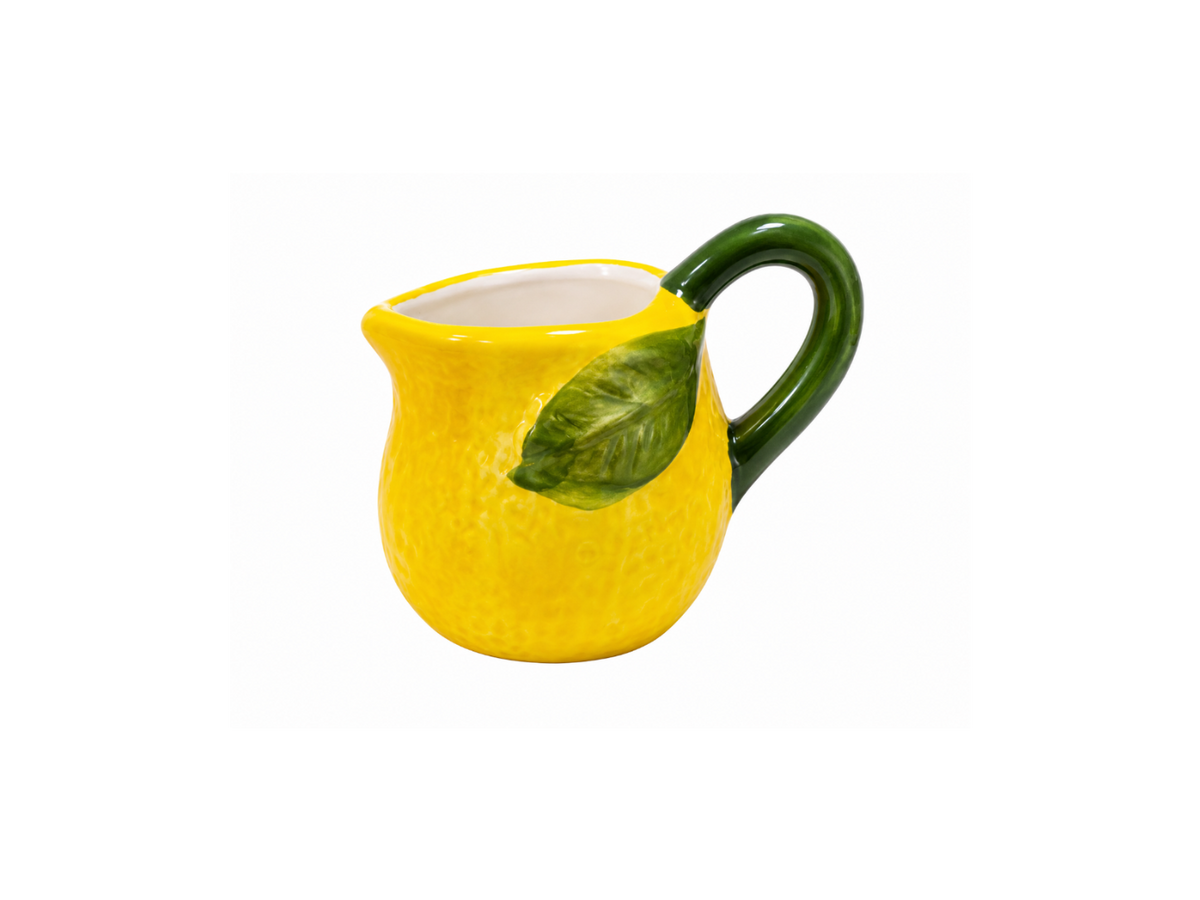Mini yellow lemon-shaped hand-painted Italian ceramic milk jug with green handle