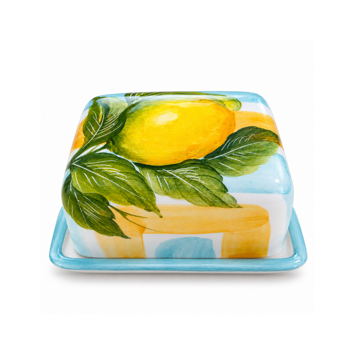 Hand-painted ceramic butter dish with yellow lemon, green leaves and pale blue edging on a white background.
