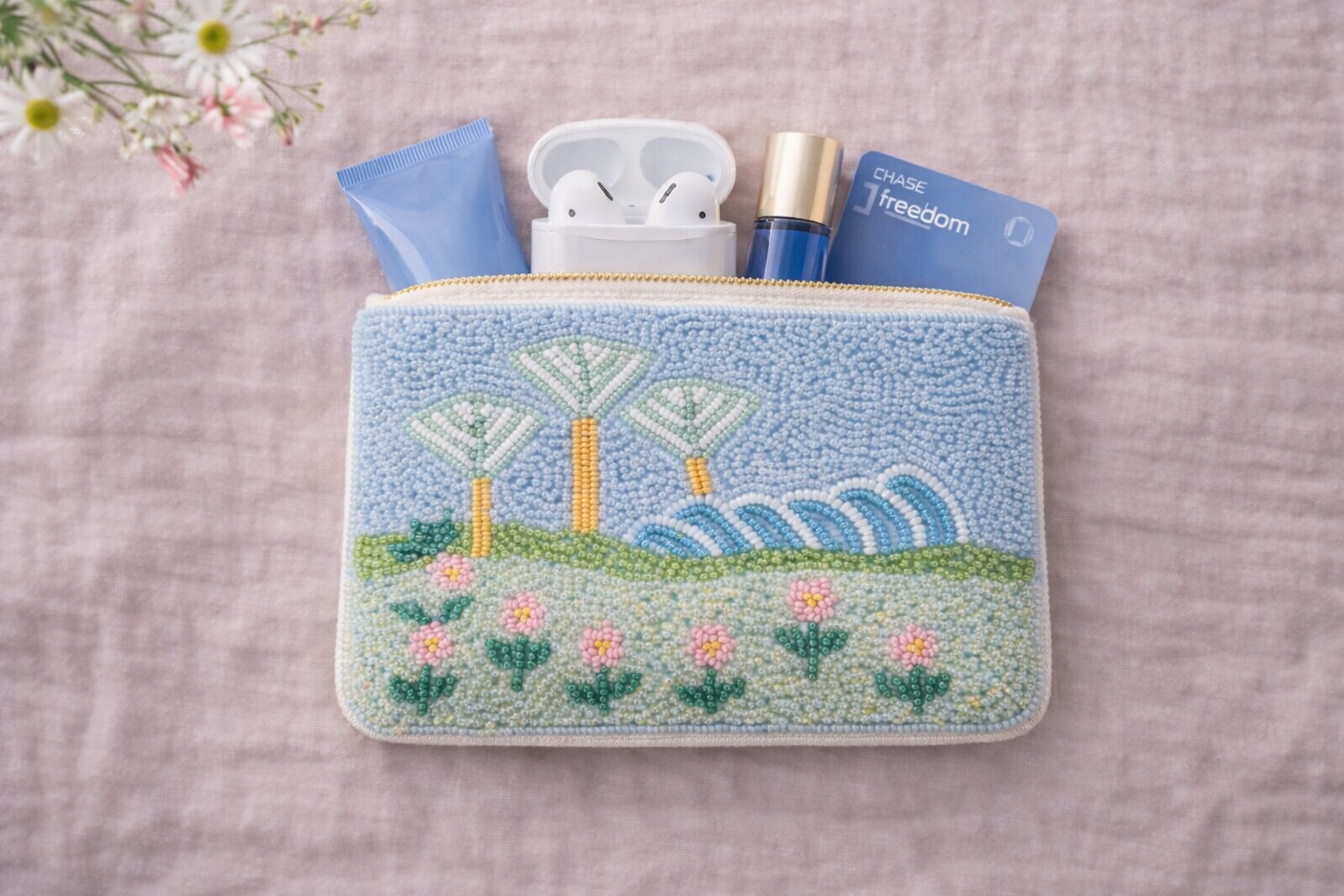 Beaded pouch with a scenic design Singapore's famous Gardens by the Bay at Marina Bay and things it can fit